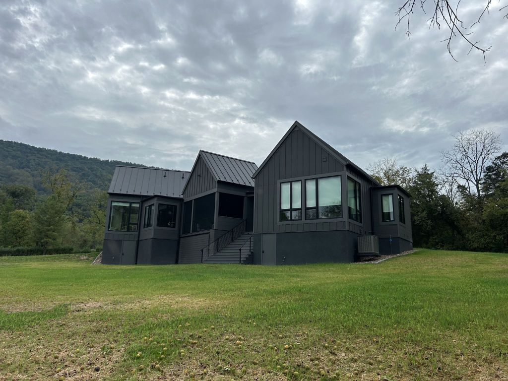 Rear view of modern full black exterior house.